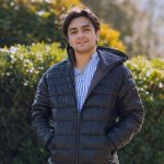 man black jacket standing park waiting someone high quality photo 150x150 1